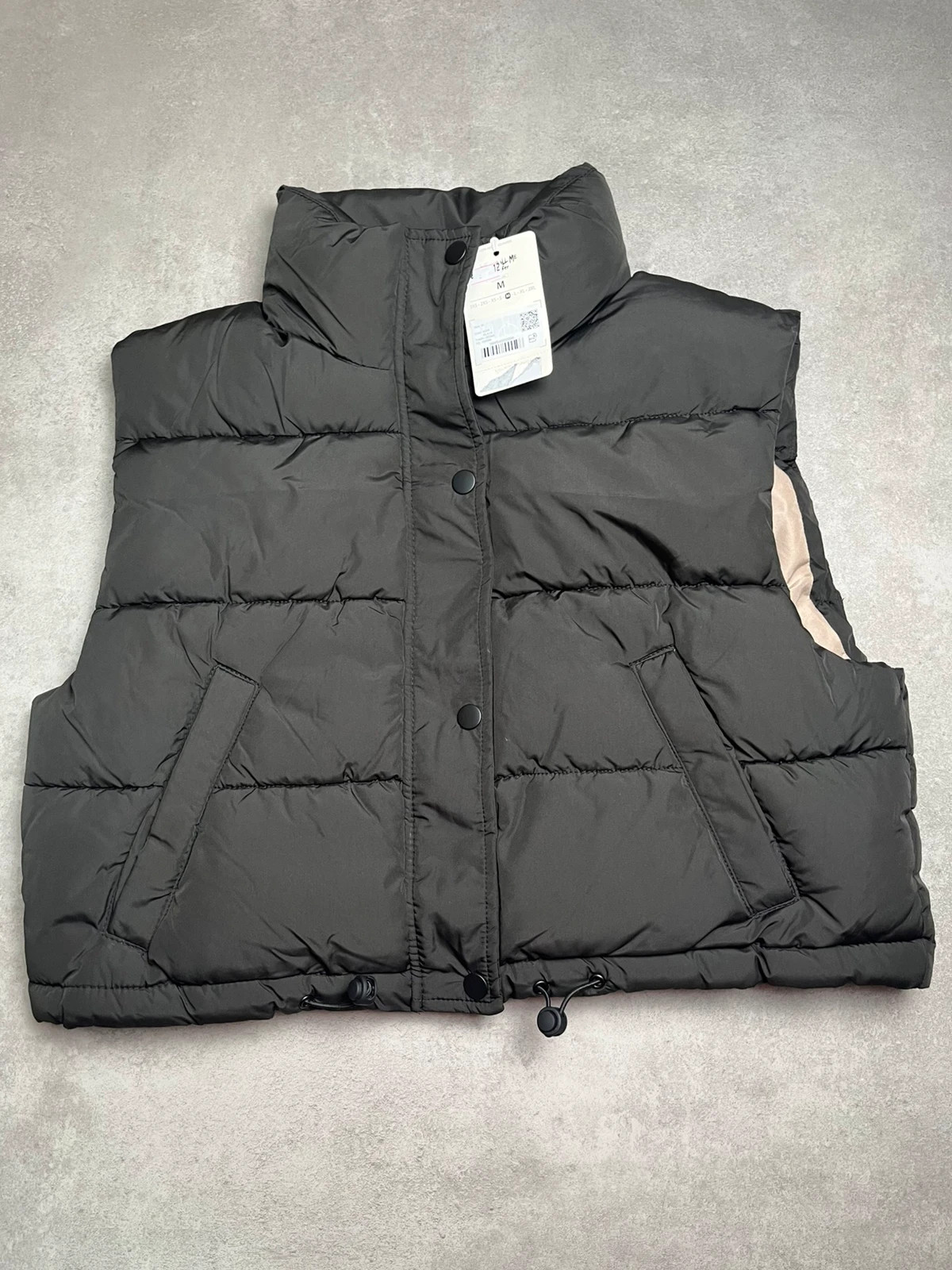 Doudoune sans manche noir et beige taille M