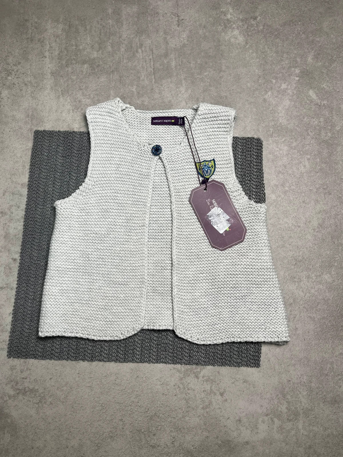 Gilet sans manche gris taille 12 mois
