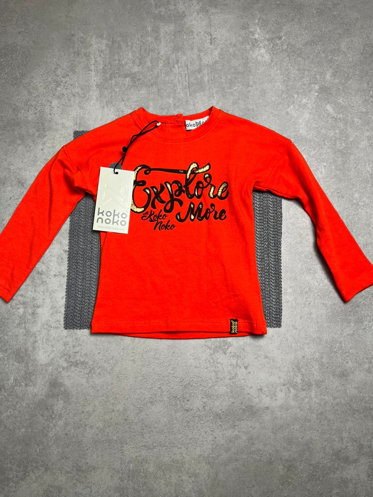 Tee shirt rouge taille 12 mois