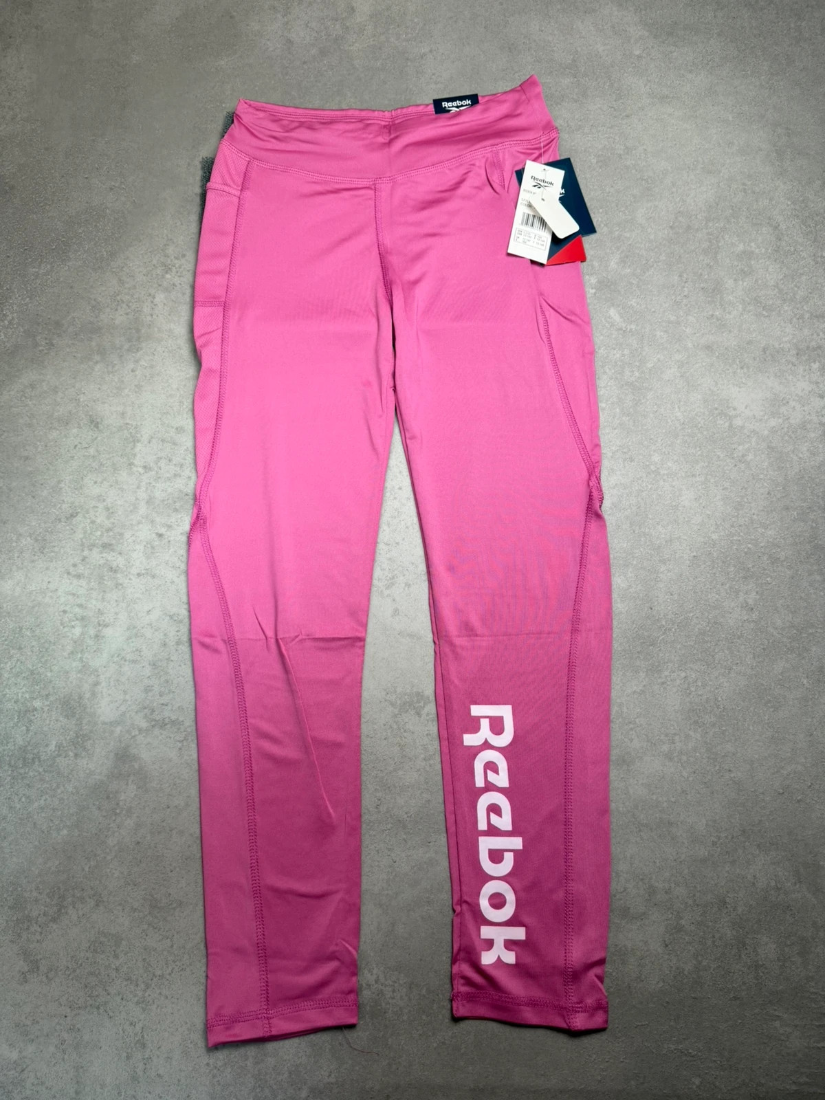 Legging de sport Reebok fuschia taille 13 ANS