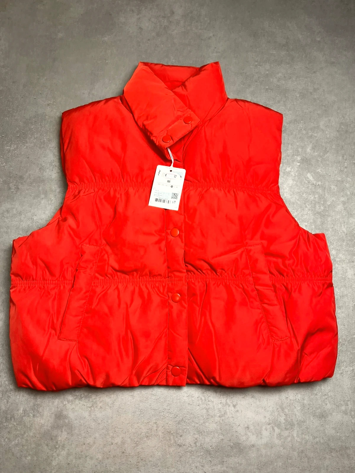 Doudoune sans manche rouge taille M