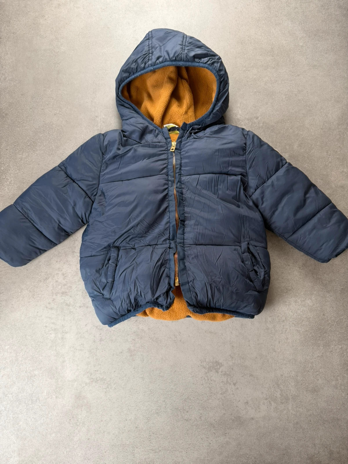 Doudoune Tape à l'Oeil bébé bleu marine capuche polaire